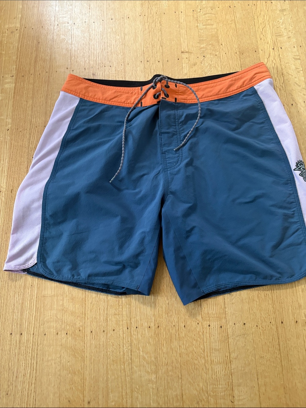 Rip Curl Teal Swim Board Shorts with Orange Waistband and White Side Panels